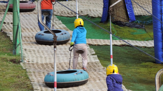 Adopted young children having fun at donut slopes